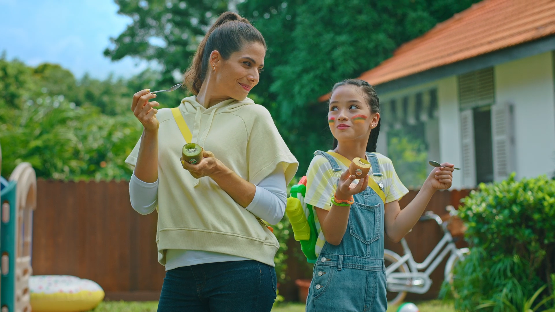 Zespri Kiwi ↳ A spot to show the first time moms allow kids to play with waterguns during a windy cloudy day.